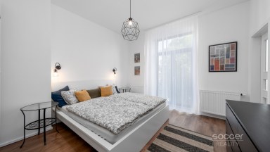 Velmi krásný nadstandardní byt ve vile se zahradou.