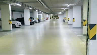 Pronájem krytého garážového stání, 12 m² – Praha 9, Vysočany (Nová Harfa).