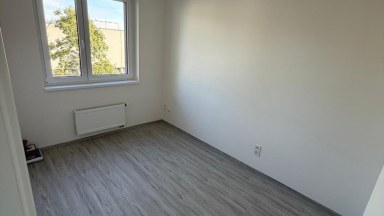 Pronájem novostavby bytu 2 + kk/L/G/S v Praze 15 - Hostivař, ulice Arnošta Staňka.